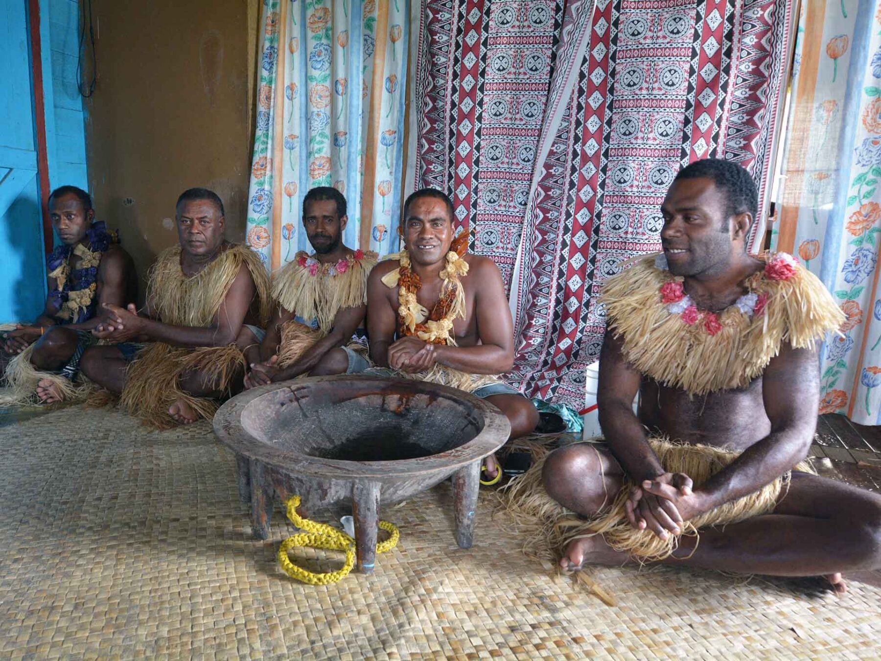 Pacific islanders around a Kava bowl
